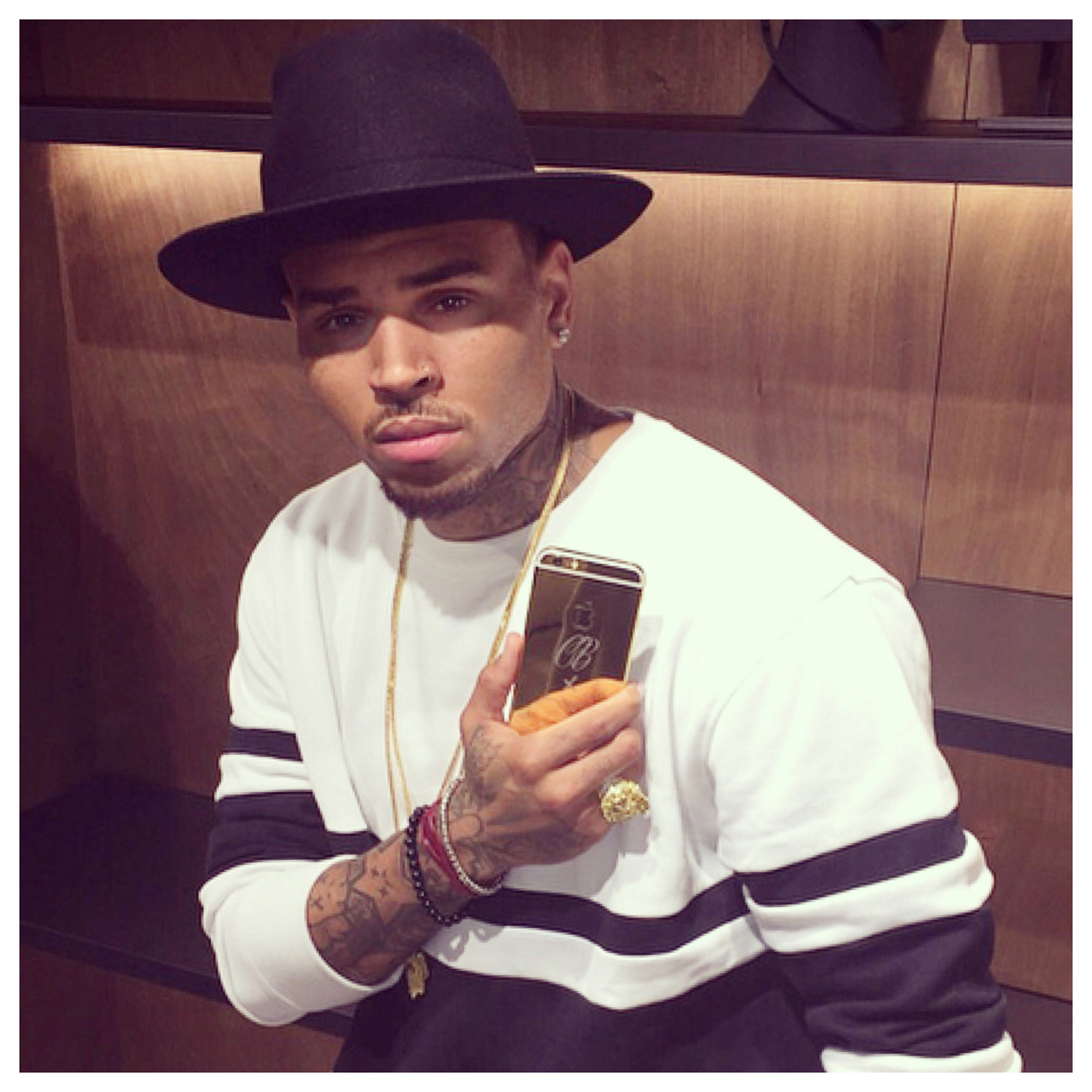 Chris Brown with 24k Gold customised iPhone 6