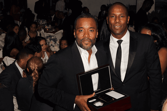 Laban Roomes Awarding Director Lee Daniels With A 24k Gold iPhone For Film Director Achievements